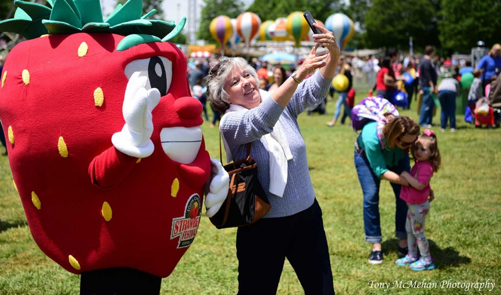 Selfie with a strawberry character at the annual Strawberry Festival in McBee, South Carolina