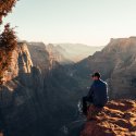Man looks out over Zion Canyon