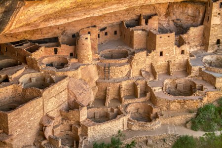 Photo of the ancient cliff dwellings carved into the mountains of Mesa Verde, CO.