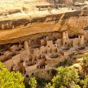 Mesa Verde, Colorado, cliff dwellings are carved into mountainous rocks.